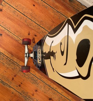 Longboard Moai 38” Sancheski - Cruiser ruedas roja
