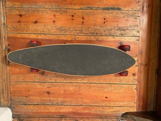 Longboard Moai 38” Sancheski - Cruiser ruedas roja
