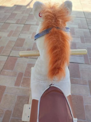 Caballito balancín de peluche