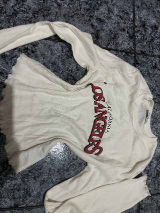 Top manga larga blanco con estampado