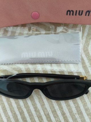 Gafas de sol Miu Miu mujer negras y rosas