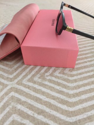 Gafas de sol Miu Miu mujer negras y rosas