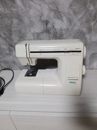 Máquina de coser REAL Mod. 404