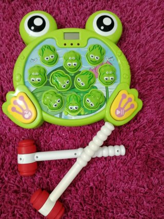 Juego musical de ranas con martillos