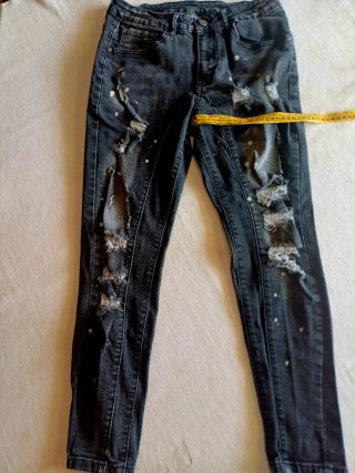 Jeans neri strappati uomo/donna