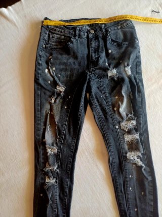 Jeans neri strappati uomo/donna