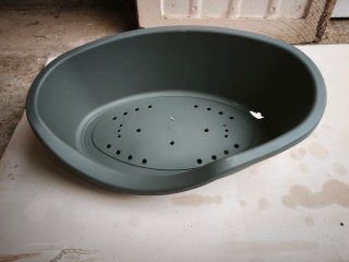 Cama para perro ovalada gris