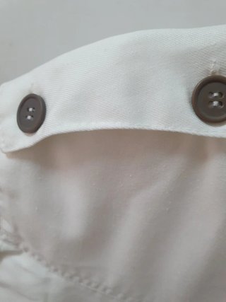 Mono blanco sin mangas