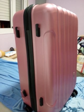 Maleta rosa de viaje