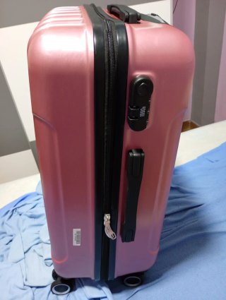 Maleta rosa de viaje