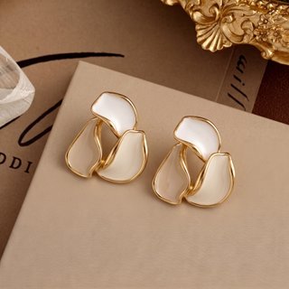 Pendientes Pétalos de Flor • Bañados en oro de 18