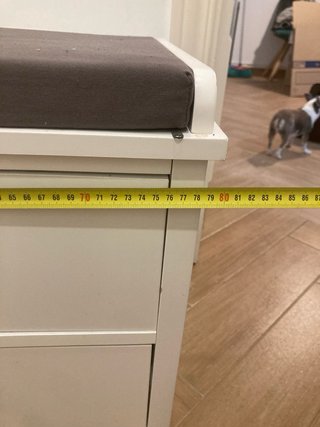 Mueble recibidor con cojín y cajones en Terrassa