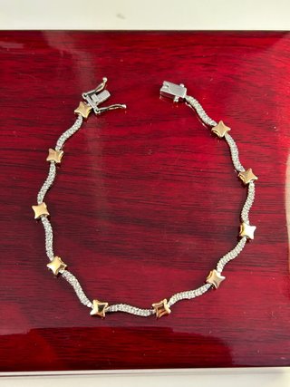 Pulsera estrellas oro blanco