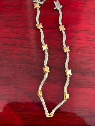 Pulsera estrellas oro blanco