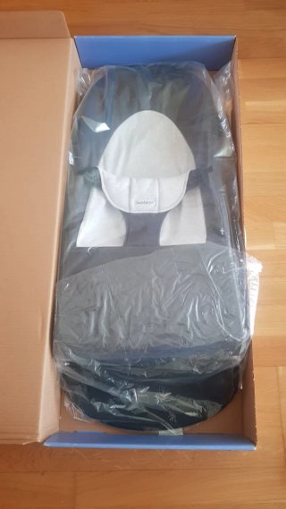 Hamaca BabyBjörn gris + juguete