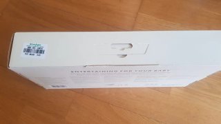 Hamaca BabyBjörn gris + juguete