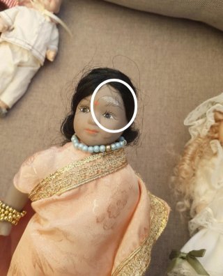 Lote de 4 muñecas de porcelana