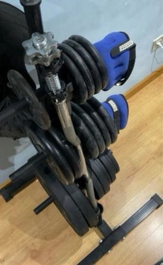 Lote de pesas y barra musculación