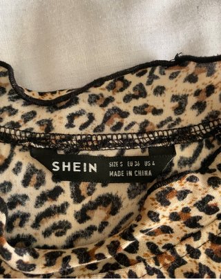 Top leopardo manga larga