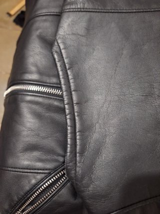 Chaqueta Zara efecto piel negra