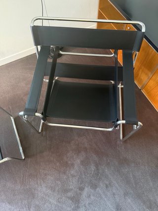 Poltrona Kartell in pelle e metallo