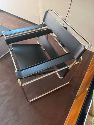 Poltrona Kartell in pelle e metallo