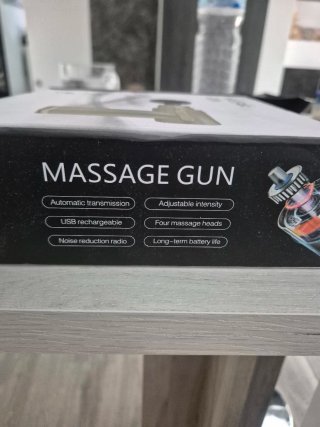 Pistola de masaje