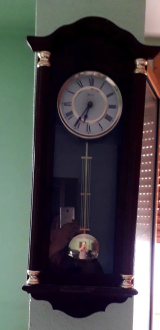 Reloj de péndulo antiguo