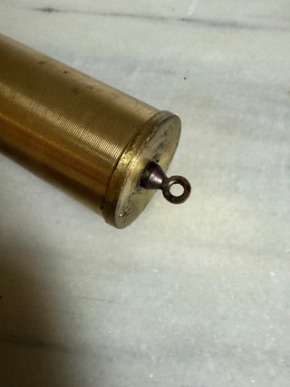 Pesa para reloj de pared