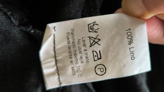Chaqueta de lino negra con detalles