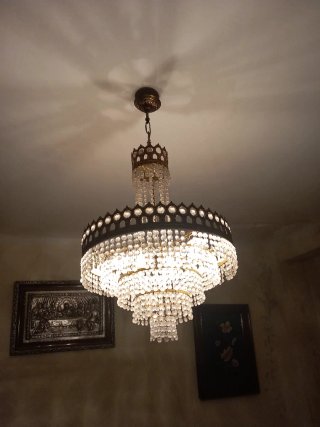 Lámpara de cristal y metal dorada