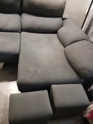 Sofá gris de tela