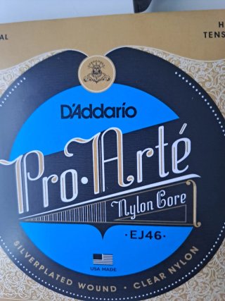 Cejilla y Cuerdas Guitarra D'Addario