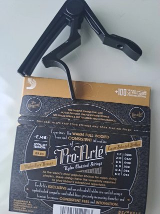 Cejilla y Cuerdas Guitarra D'Addario