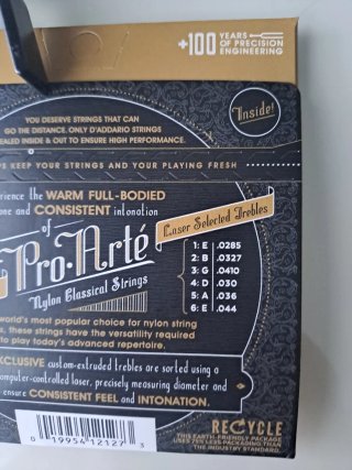 Cejilla y Cuerdas Guitarra D'Addario