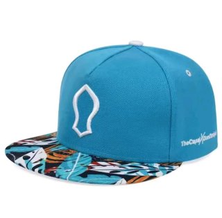 Gorra de béisbol azul con estampado tropical