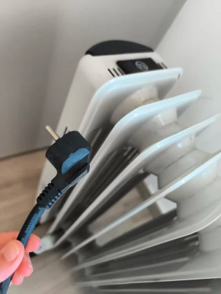 Radiador eléctrico blanco y negro