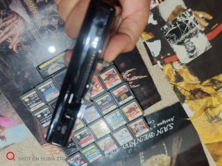 Nintendo DS Lite con 25 cartuchos