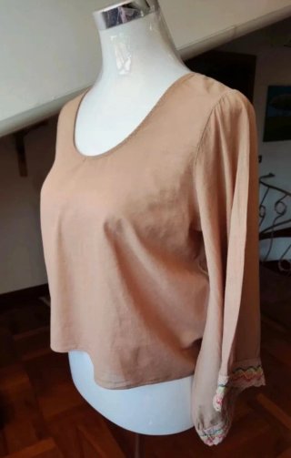 Blusa donna color pesca con fiocco