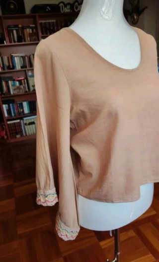 Blusa donna color pesca con fiocco