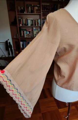 Blusa donna color pesca con fiocco