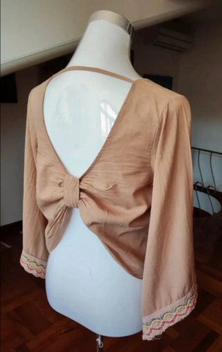 Blusa donna color pesca con fiocco