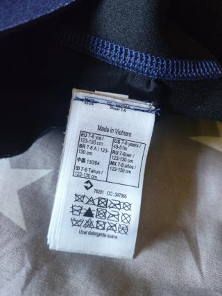Neopreno niño Decathlon azul y verde. Talla 7/8