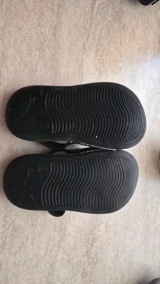 Ciabattine Puma con cinturino per bambino/a - Nere