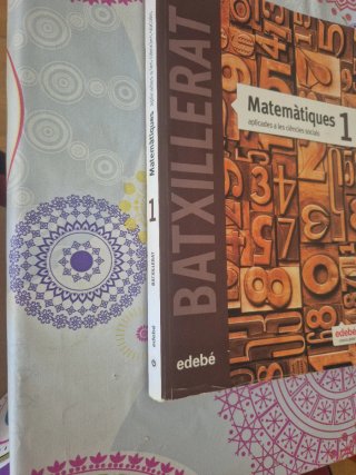 Matemàtiques aplicades a les ciències socials 1...
