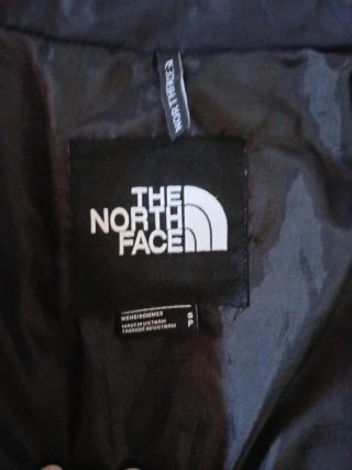 The North Face plumífero azul y negro