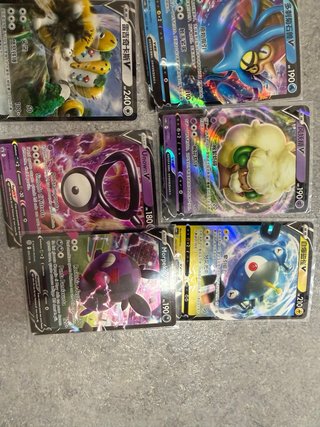 Lotto 12 carte Pokemon