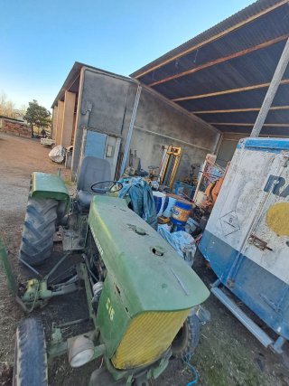 Tractor John Deere 515 con segadora