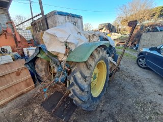 Tractor John Deere 515 con segadora