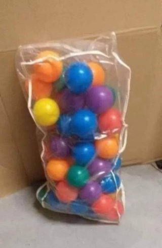 Carrito de compras y peluche rosa